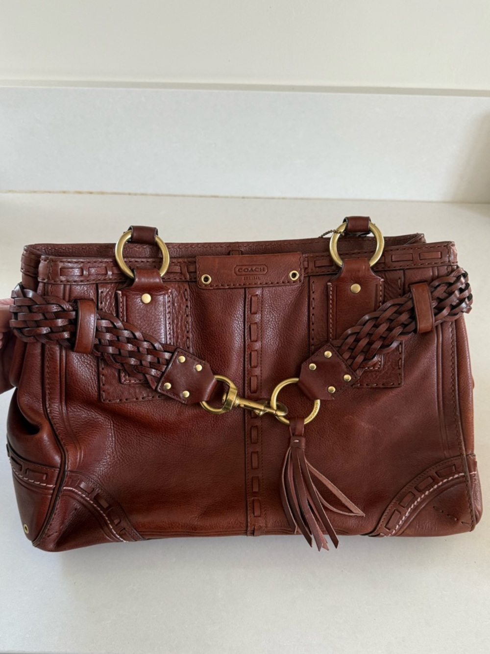 Coach Chestnut Brown Leather Handbag with Braided Handle and Tassel